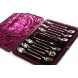 SET OF TWELVE VICTORIAN SILVER TEASPOONS AND TONGS in a fitted case,