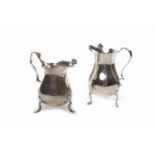 BALUSTER SILVER CREAM JUG OF GEORGE III DESIGN with a scroll handle, on three hoof feet,