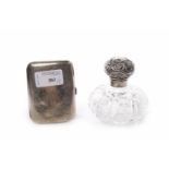 LATE VICTORIAN SILVER LIDDED TOILETTE BOTTLE with chased foliate decoration, monogrammed,