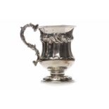 ATTRACTIVE MID-VICTORIAN SILVER CHRISTENING MUG of fluted baluster form,