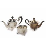 VICTORIAN SILVER CIRCULAR TEAPOT with serpentine border, scroll handle, on four hoof feet,