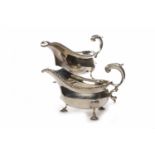 ATTRACTIVE PAIR OF OVAL SILVER SAUCE BOATS OF GEORGE III DESIGN with gadrooned borders,