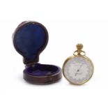 GARDNER & CO OF GLASGOW POCKET ANEROID BAROMETER of circular form and in gilt metal,