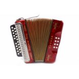 HOHNER DOUBLE-RAY MELODEON with two rows of treble buttons,