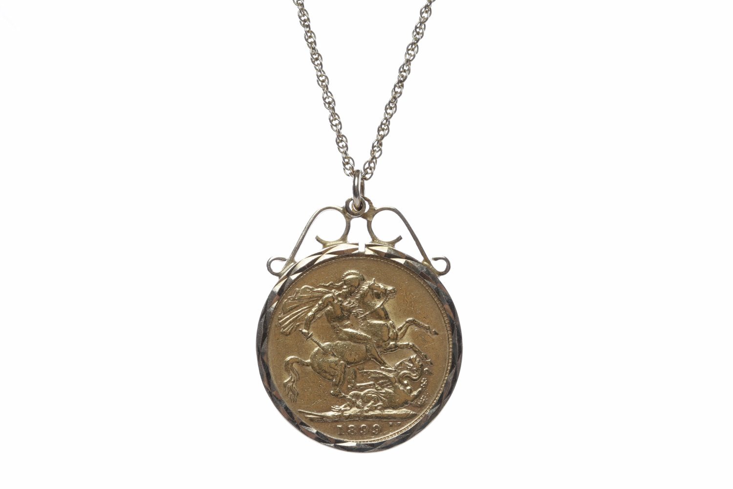 GOLD SOVEREIGN DATED 1899 in a nine carat gold pendant mount, with chain, 11.