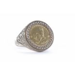 GOLD 1/10 OZ KRUGERRAND COIN DATED 1981 in a nine carat gold ring,