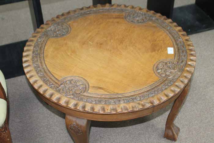 CARVED WALNUT TABLE AND AN UPHOLSTERED CHAIR