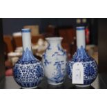 CHINESE BLUE AND WHITE PAIR OF BALUSTER VASES and another blue and white vase (3)