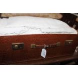 LOT OF LINEN in a vintage leather suitcase