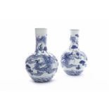 PAIR OF MID 20TH CENTURY CHINESE BLUE AND WHITE VASES with dragon decoration, mark to base,