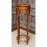 MID 20TH CENTURY CHINESE HARDWOOD JARDINIERE STAND the circular top with pierced frieze section