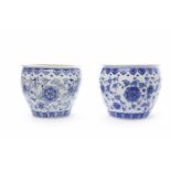 TWO MID 20TH CENTURY CHINESE BLUE AND WHITE PLANTERS with floral decoration to the exterior, 35.