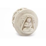 EARLY 20TH CENTURY INDIAN IVORY BOX WITH COVER of oval form, the lid with seated Buddha,