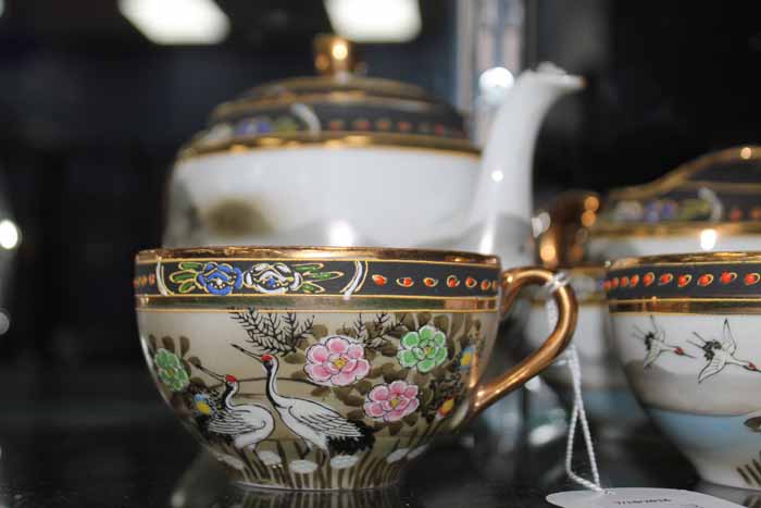 MID-20TH CENTURY JAPANESE EXPORT EGGSHELL TEA SET decorated with cranes in a polychrome scene,