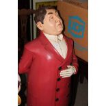 COMPOSITE FIGURE MODELLED AS A BUTLER the top lifts to reveal CD rack underneath,