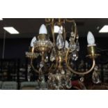 CHANDELIER IN THE VICTORIAN MANNER with four branches and faceted drops