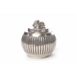 CHINESE SILVER FLUTED GLOBULAR TEA CANISTER the detachable cover with dog of foe finial,