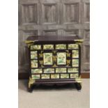 MID 20TH CENTURY CHINESE CABINET the drawer and door fronts with ivory effect panels painted with