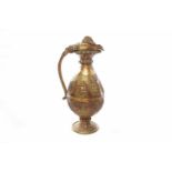 EARLY 20TH CENTURY EASTERN GILT METAL EWER likely Chinese or Tibetan in origin,