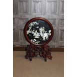 MID 20TH CENTURY CHINESE TABLE SCREEN the circular panel with exotic bird, on carved wood stand,