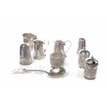 COLLECTION OF MALAYAN SILVER CONDIMENTS comprising a set of pepper, open salt and sugar,