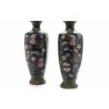 PAIR OF EARLY 20TH CENTURY CHINESE CLOISONNE VASES with blossom decoration overall,