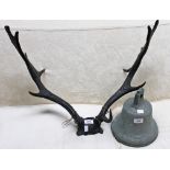 A HEAVY CAST BRONZE SHIPS BELL, 10in (26cm); together with an old stag antlers, 25in (64cm)w.