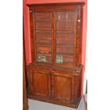 A GOOD QUALITY EARLY VICTORIAN MAHOGANY BOOKCASE, the moulded cornice over two glazed doors,