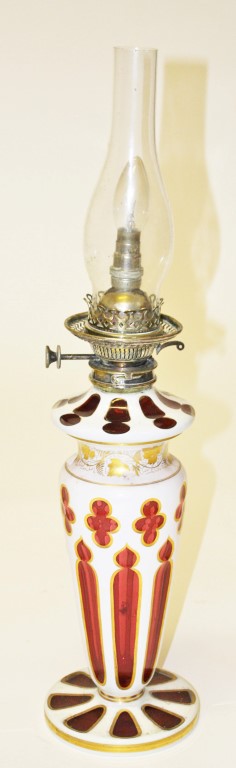 A 19TH CENTURY BOHEMIAN RUBY AND CREAM GLASS OIL LAMP, 
with glass reservoir and vase shaped stem, - Image 2 of 2