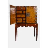 A FINE EARLY 19TH CENTURY SATINWOOD AND ROSEWOOD BANDED BRASS BOUND CABINET ON STAND,