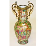 A 19TH CENTURY CANTONESE PORCELAIN VASE, with ormolu mounts and two dragon handles,