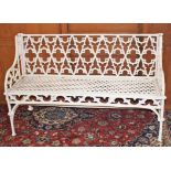 A HEAVY CAST IRON GARDEN SEAT, in the Gothic style,