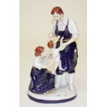 A FINE LARGE HAND PAINTED ROYAL DUX PORCELAIN GROUP, 
modelled with blacksmith, wife and child,