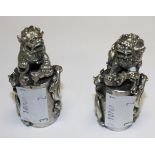 A PAIR OF CHINESE MIAO WHITE METAL SEALS, one modelled with Kylin lion and cub,