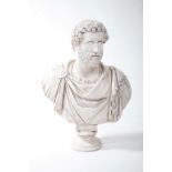 A LARGE COMPOSITION BUST OF THE EMPEROR ANTONINUS PIUS,
raised on a turned socle,