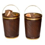 A VERY ATTRACTIVE PAIR OF IRISH GEORGIAN STYLE SPIRAL REEDED MAHOGANY AND BRASS BOUND PEAT BUCKETS,