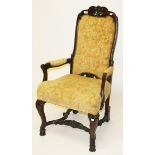 A HIGH BACK CONTINENTAL WALNUT ARMCHAIR, 
in the 18th century style,