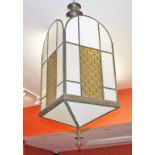 A LARGE SQUARE AND BRONZE METAL ART DECO LANTERN, 
the four arched panels,