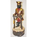 A VERY UNUSUAL CARVED POLYCHROME AND PARCEL GILT STICK STAND, 
in the form of a monkey,