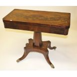 A LATE REGENCY PERIOD MAHOGANY FOLD OVER CARD TABLE, the top with rounded corners,