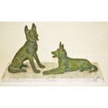 A BRONZE GROUP, 
modelled with two German Shepherds, one recumbent, the other seated,