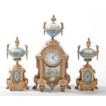 A THREE PIECE GILT METAL AND SÉVRES STYLE PORCELAIN MANTEL CLOCK GARNITURE,