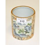 A CHINESE FAMILLE ROSE PORCELAIN BRUSH POT, the two panels decorated with landscapes,