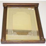 A SMALL PIER MIRROR, 
with reeded pilasters, each headed with flower head, under a moulded cornice,