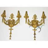 A SET OF FOUR ATTRACTIVE TWO BRANCH GILT BRASS WALL LIGHTS, 
in the Adam's style,