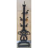 A HEAVY VICTORIAN CAST IRON HALL STAND, 
the hooks in the form of stylized griffin's (one missing),