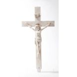 A CARVED WHITE MARBLE STATUARY CRUCIFIX, 
35in (89cm)h x 17in (44cm)w.