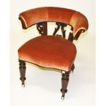 A VICTORIAN HORSE SHOE SHAPED MAHOGANY DESK CHAIR,