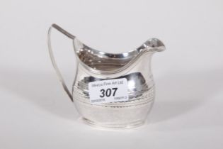 A GEORGE III BRIGHT CUT SILVER CREAM JUG, of ogee form, London 1811, 95gr.