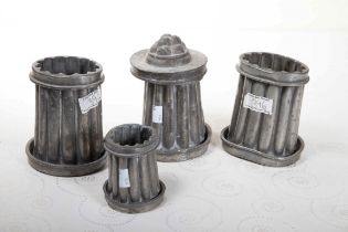 A COLLECTION OF EIGHT VARIOUS 19TH CENTURY PEWTER FOOD AND JELLY MOULDS,